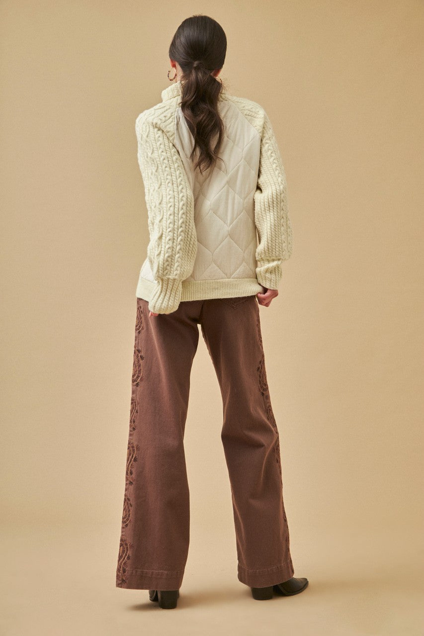 Maglione trapuntato a collo alto