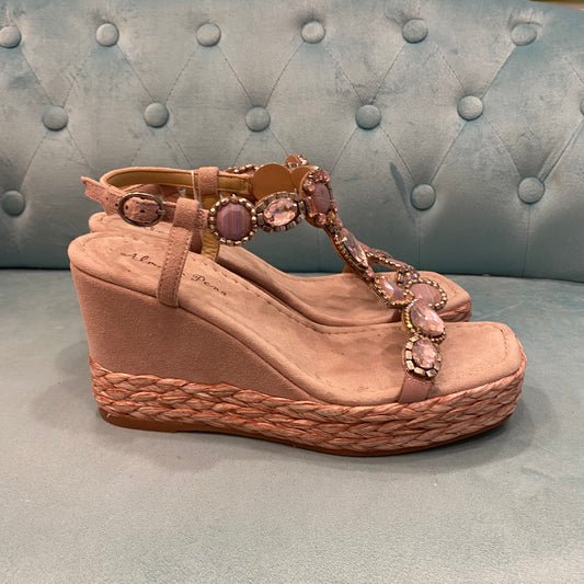 Zeppa con pietre rosa