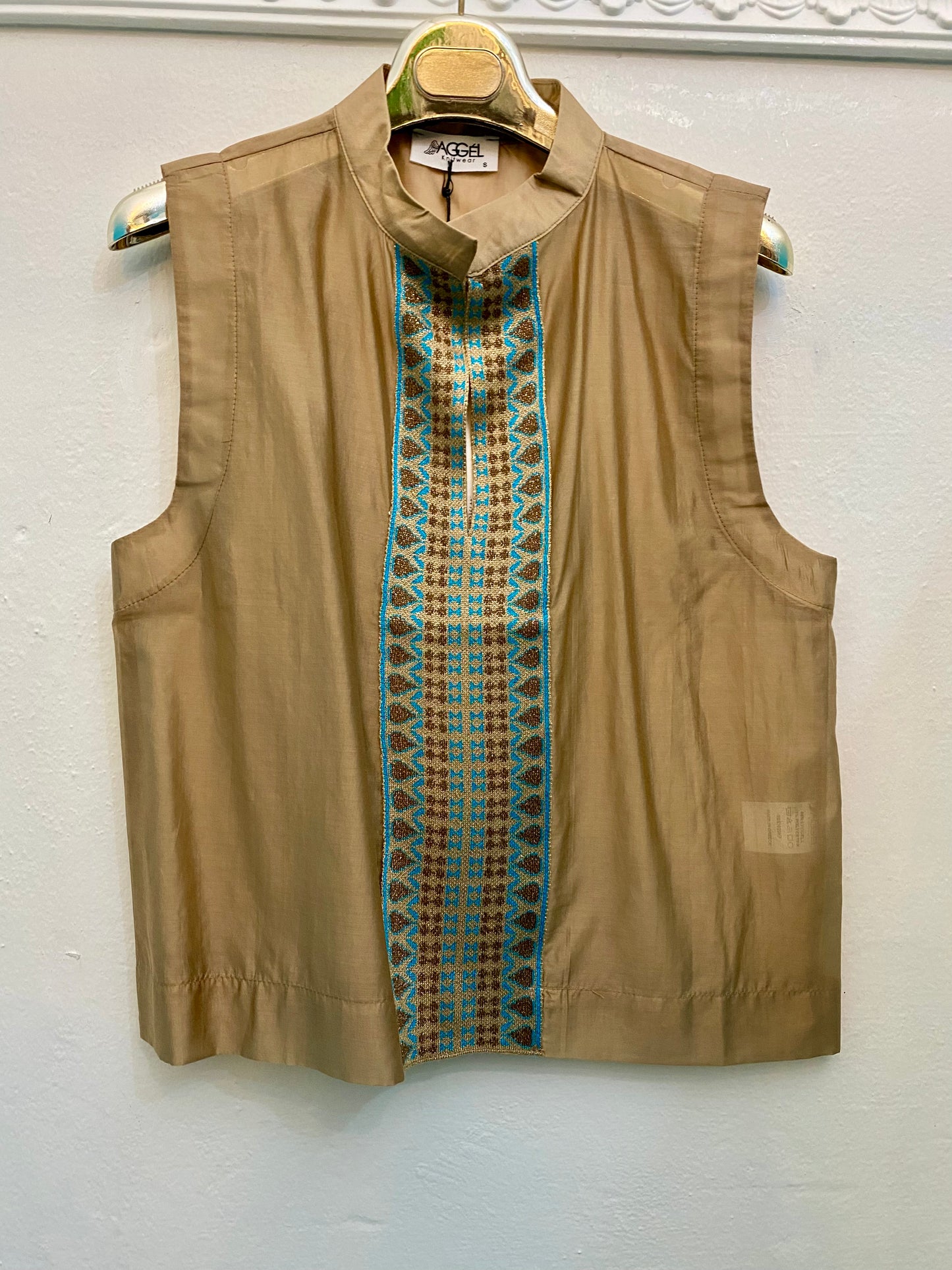 Top turchese con dettagli in maglia lurex