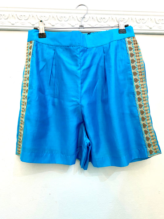Shorts turchesi con dettaglio in maglia