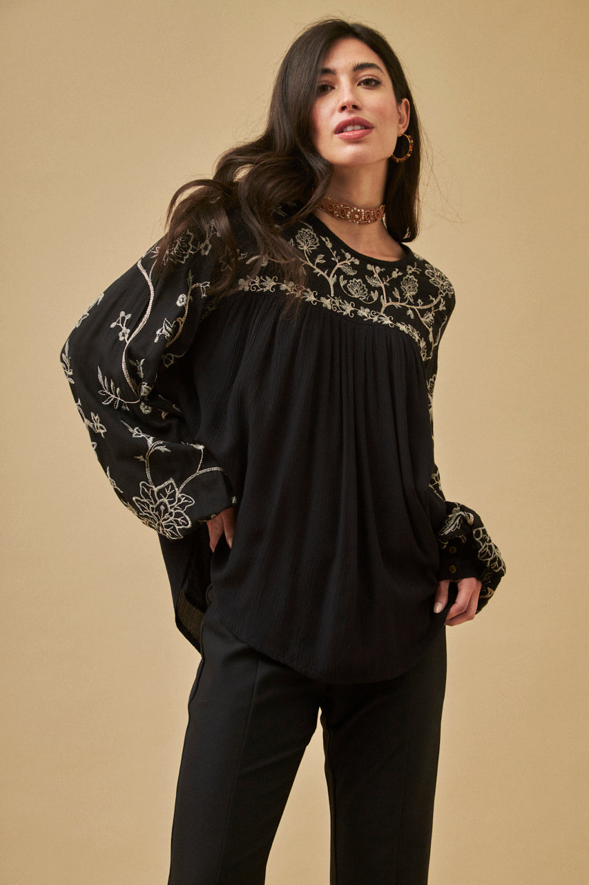 Blouse with gathered floral embroidery
