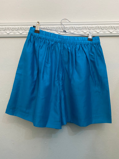 Shorts turchesi con dettaglio in maglia