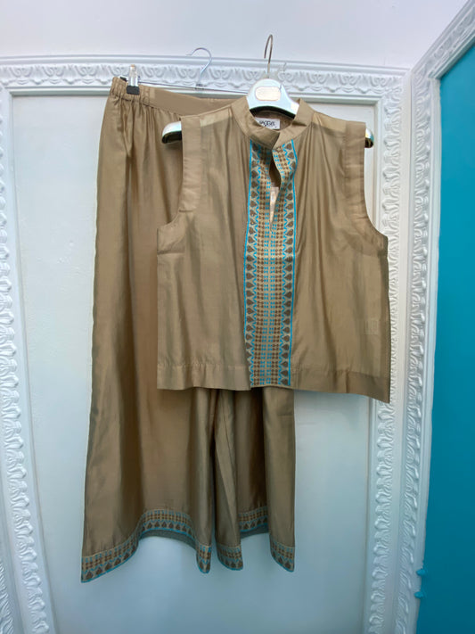 Pantalone con dettagli in maglia lurex