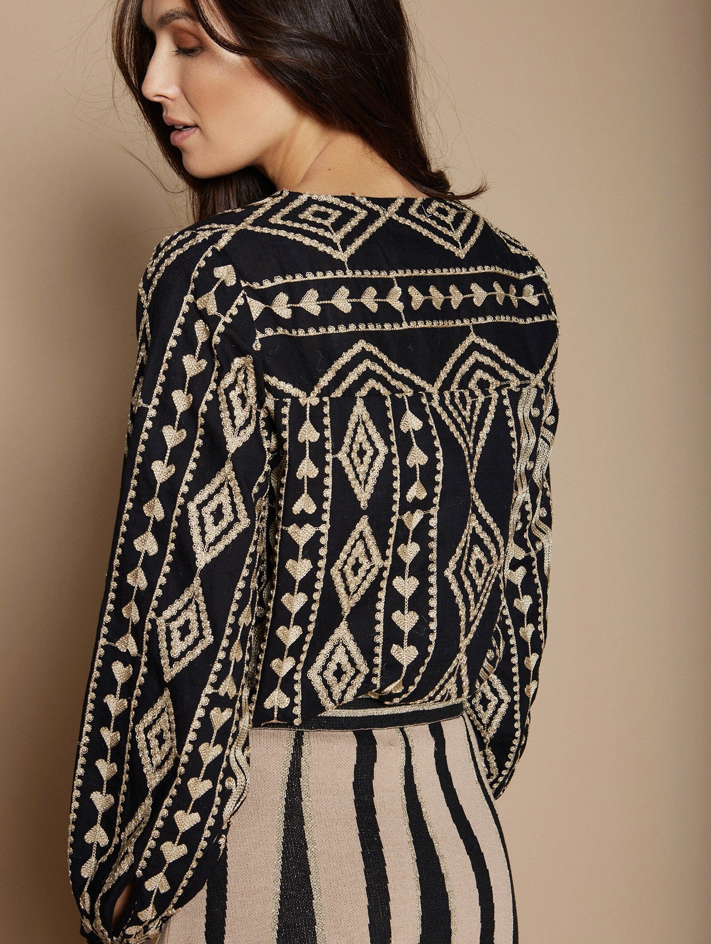 Blusa in tessuto ricamato