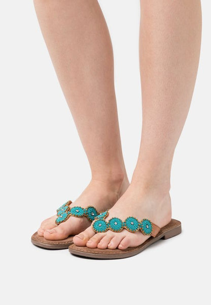 Turquoise flip flops